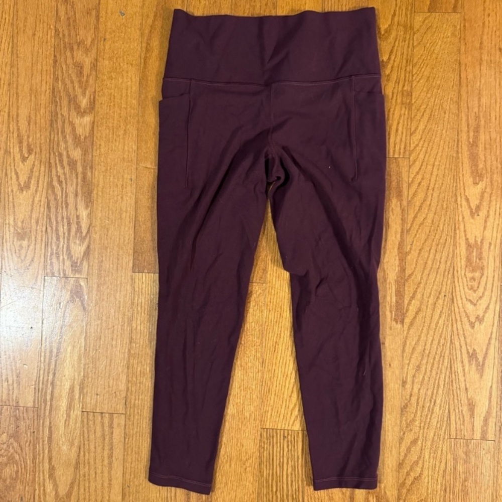 Athleta Salutation stash tights size medium